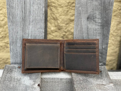 Zep-Pro Lab Concho 1/2 Mossy Oak Camo/Brown Bi-fold Wallet inside view shows:
Brown distressed leather
3 interior credit card slots
2 interior pockets
1 pullout ID case
2 bill-cash compartments